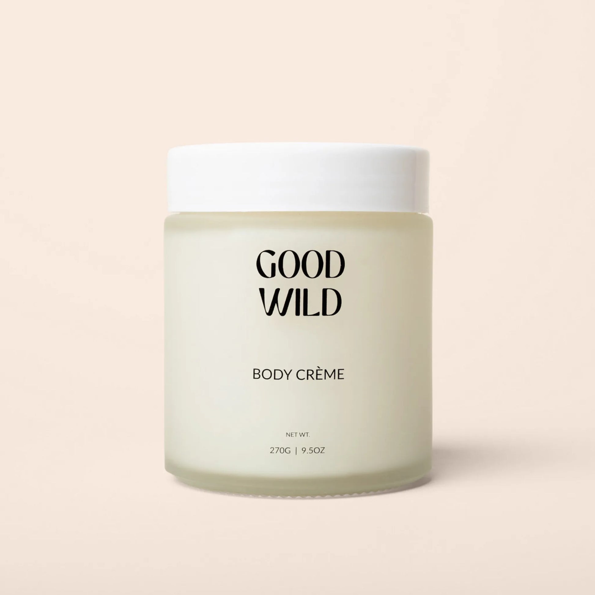 Jar of 'Good Wild' body crème on a beige background