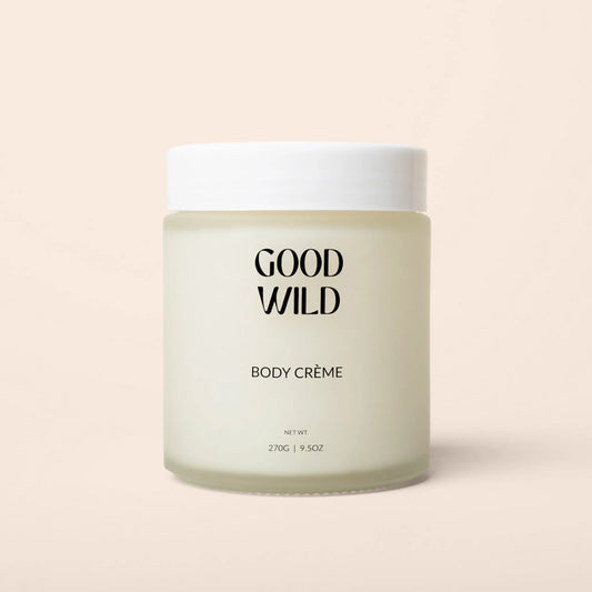 Jar of 'Good Wild' body crème on a beige background