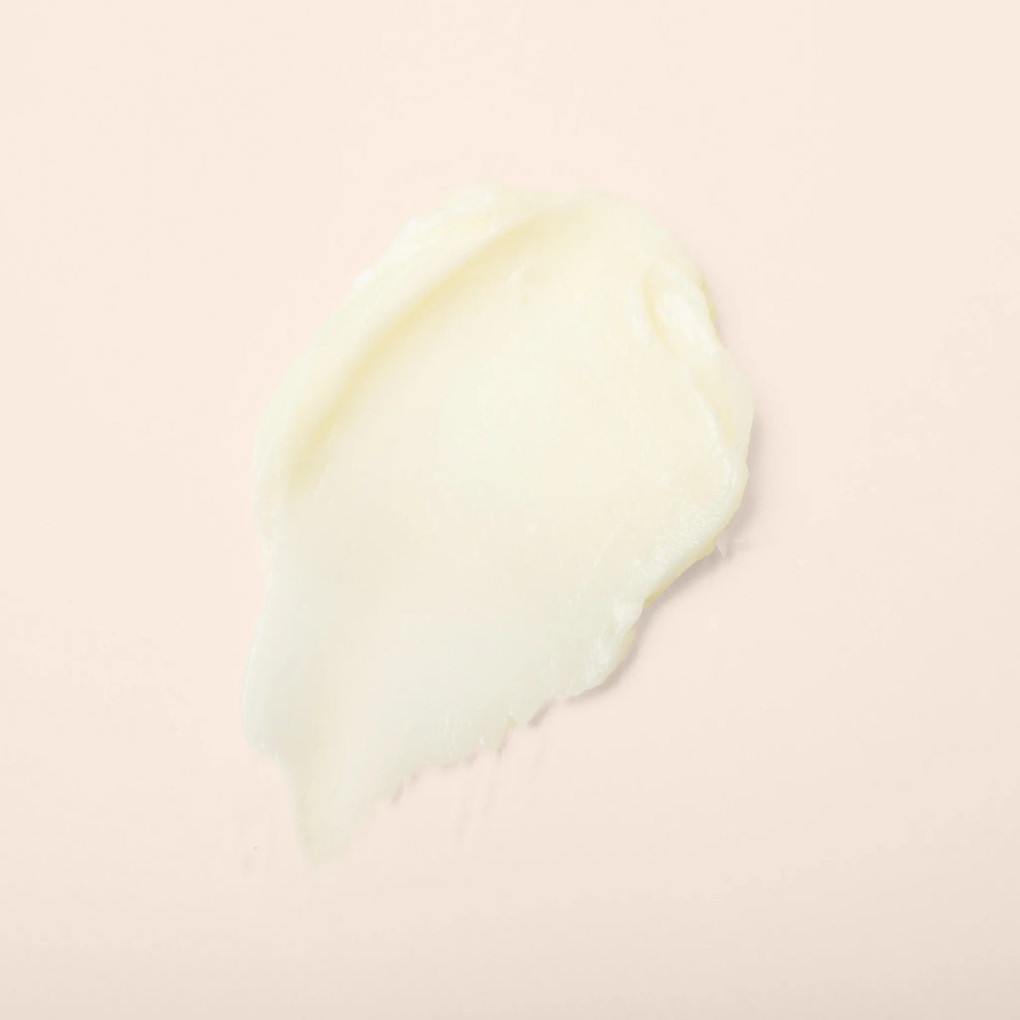 Pastel pink and yellow gradient on a light pink background